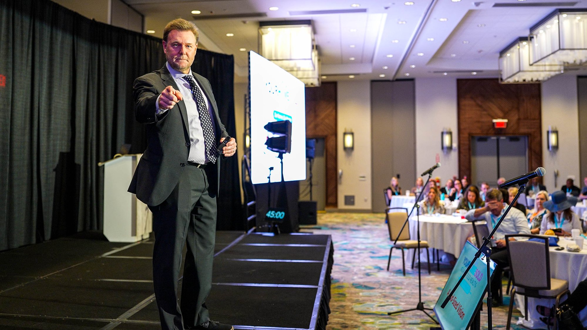 Todd Walters speaking on stage